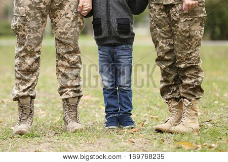 Military family reunited on a sunny day,  closeup