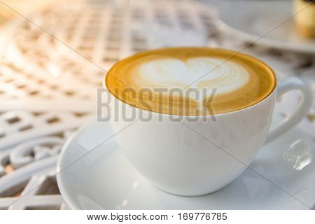 coffee cup and latte art in holiday