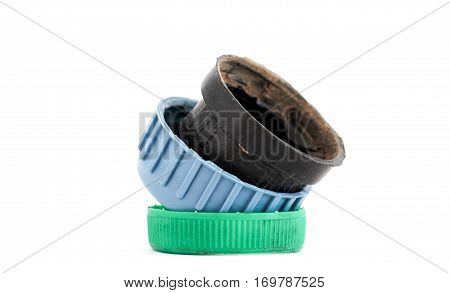 image of a three bottle caps from chemical liquid on white background
