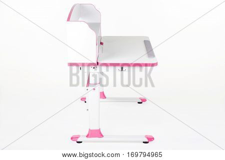 pink school desk is isolated on a white background