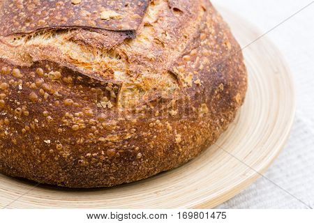 Homemade artisan bread on a round plate
