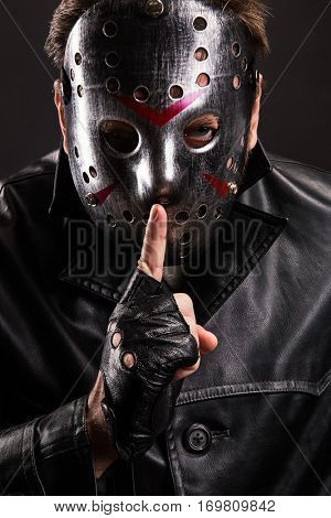 Serial maniac in hockey show do not talk sign