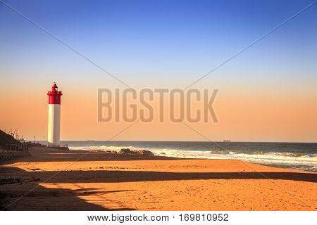 Umhlanga Lighthouse on the Indian Ocean Shore in Durban, South Africa.