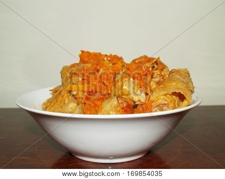 stuffed cabbage is a dish of stuffing wrapped in cabbage leaves.