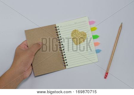 Writer recycled paper notebook open front cover on white background
