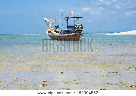 fishing boat in beach blue sky in aisia
