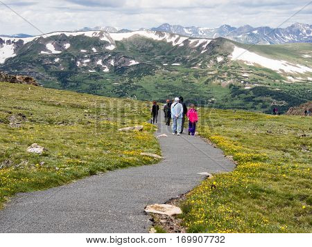 Rocky Mountain National Park USA - July 14 2015: Visitors hiking on trail along Trail Ridge road in Rocky Mountain National Park