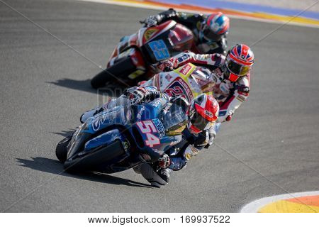 VALENCIA, SPAIN - NOV 13: 54 Pasini, 22 Lowes, 23 Schrotter in Moto2 Race during Motogp Grand Prix of the Comunidad Valencia on November 13, 2016 in Valencia, Spain.