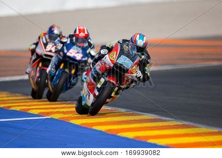 VALENCIA, SPAIN - NOV 13: 23 Schrotter, 54 Pasini, 94 Folger in Moto2 Race during Motogp Grand Prix of the Comunidad Valencia on November 13, 2016 in Valencia, Spain.