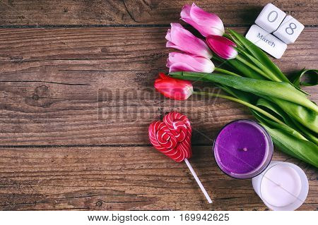 Pink Tulip Flowers on rustic table for March 8, International Womens Day, Birthday , Valentines Day or Mothers day - Top View