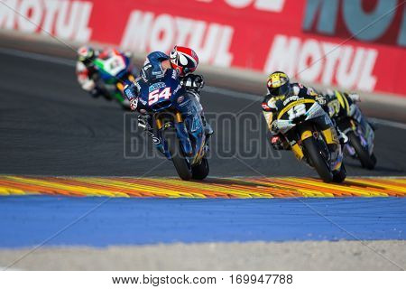 VALENCIA, SPAIN - NOV 12: 54 Pasini, 12 Luthi in Moto2 Qualifying during Motogp Grand Prix of the Comunidad Valencia on November 12, 2016 in Valencia, Spain.