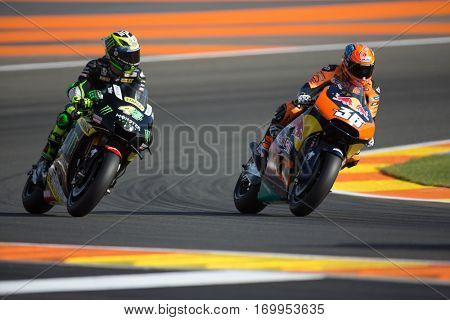 VALENCIA, SPAIN - NOV 12: 44 Espargaro, 36 Kallio during Motogp Grand Prix of the Comunidad Valencia on November 12, 2016 in Valencia, Spain.