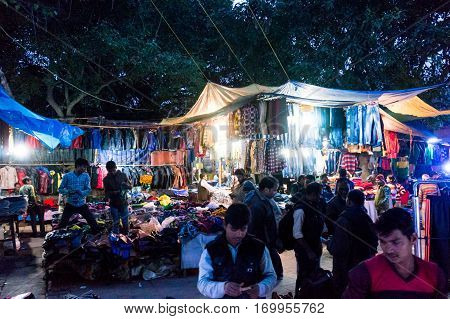 Delhi, India - 28th Jan 2017: Street market in Chandni Chowk near red fort at night. Open shops perfect for low budget items.
