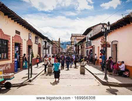 SAN CRISTOBAL, MEXICO-DEC 13, 2015:Tzotzil Maya people at main waking street of San Cristobal de las casas on Dec 13, 2015, Chiapas region, Mexico
