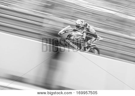VALENCIA, SPAIN - NOV 12: Jonas Folger in Moto2 practice during Motogp Grand Prix of the Comunidad Valencia on November 12, 2016 in Valencia, Spain.