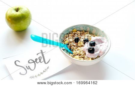 concept kid breakfast with muesli on white background.