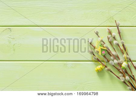 Easter background with flaffy willow and decorations, copy space