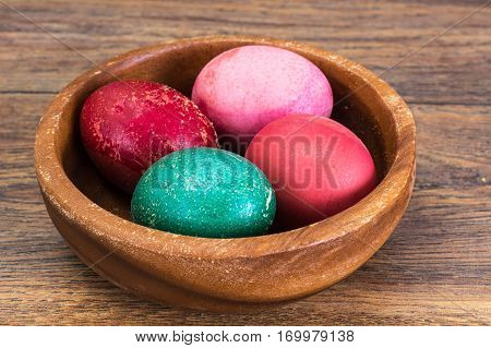 Easter painted eggs on wood. Studio Photo