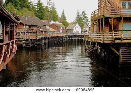 Ketchikan Alaska wooden buildings along meandering waterway