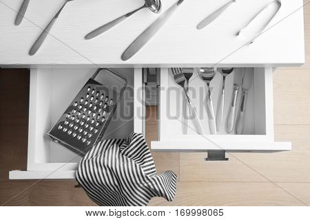 Chest of drawers with cutlery set, top view