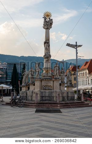 Leoben, Styria, Austria - August 06, 2018: Hauptplatz, View Of Pestsaule In The Central Square Of Th