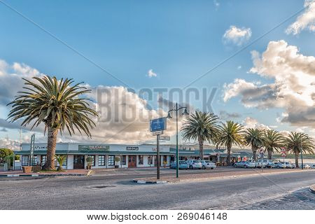 Langebaan, South Africa, August 20, 2018: A Street Scene, With Businesses And Vehicles, In Langebaan