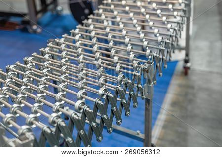 Flexible Adjustable Roller Conveyor. Poratable Innovative Products Transportation Technology For Fac