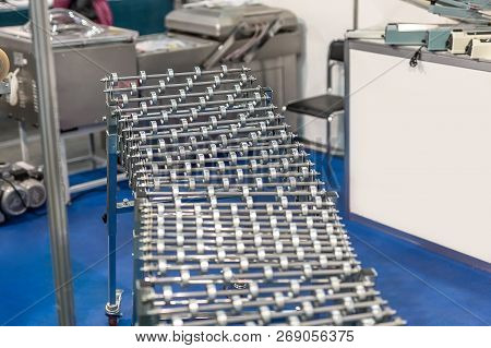 Flexible Adjustable Roller Conveyor. Poratable Innovative Products Transportation Technology For Fac