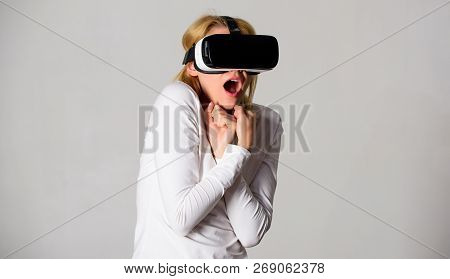 Woman Using Virtual Reality Headset. The Woman With Glasses Of Virtual Reality. Futuristic.