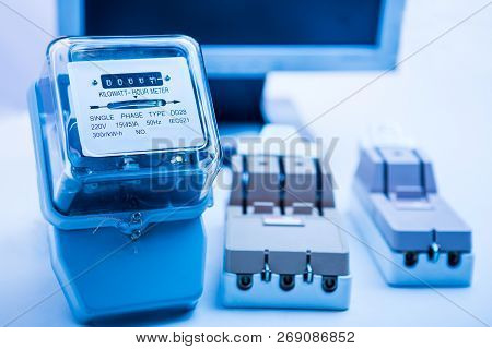 Circuit Breakers And Power Meters On The Background
