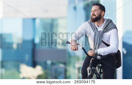 Enjoying Beautiful Cityview. Businessman Leaning On Bicycle, Having Break In Riding, Copy Space