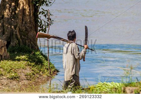Pantoja, Peru - July 13, 2015: Local Hunter On His Way To Th Jungle In Pantoja Village, Peru