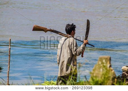 Pantoja, Peru - July 13, 2015: Local Hunter On His Way To Th Jungle In Pantoja Village, Peru