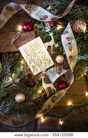 Christmas Layflat From Overhead With Ornaments Deer Reindeer Ribbon Branches Foliage Inspirational Q
