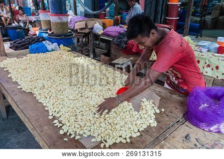 Iquitos, Peru - June 17, 2015: Garlic Seller On Belen Market In Iquitos