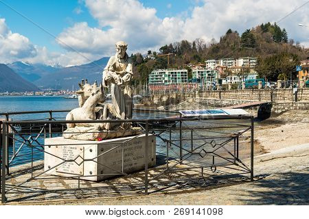 Laveno Mombello, Italy - April 5, 2018: Statues Of Saint Francis With Jesus Child On Lake Maggiore I