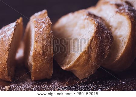 Close Up Of Batard Au Levain On Wood Plate