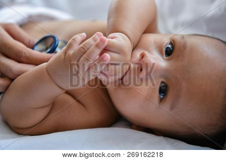 Baby Sick Concept. The Doctor Is Examining The Baby's Illness. Babies Are Not Comfortable In The Hos