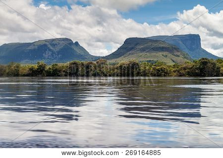 River Carrao And Tepuis Table Mountains In National Park Canaima, Venezuela.
