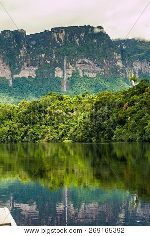 River Carrao And Tepui Table Mountain Auyan In National Park Canaima, Venezuela.