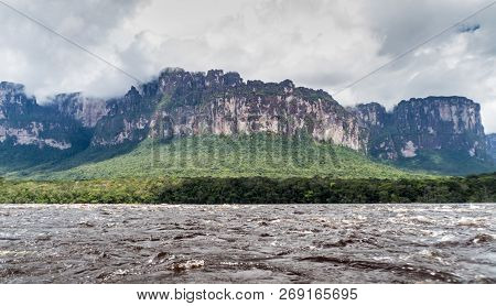 River Carrao And Tepui Table Mountain Auyan In National Park Canaima, Venezuela