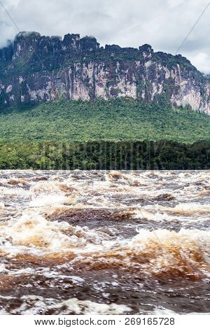 River Carrao And Tepui Table Mountain Auyan In National Park Canaima, Venezuela