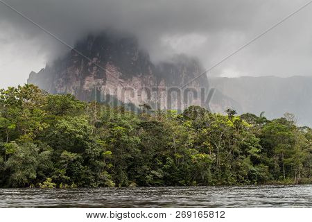 River Carrao And Tepui Table Mountain Auyan In National Park Canaima, Venezuela