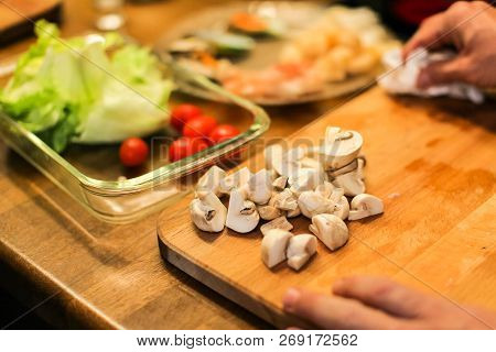 Slice Pizza In Box And Can Of Soda On Wood Background