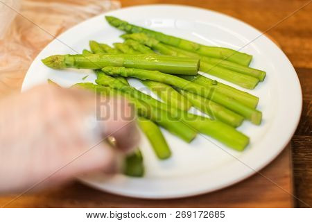 Slice Pizza In Box And Can Of Soda On Wood Background