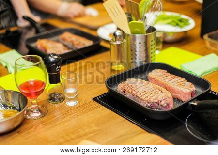 Slice Pizza In Box And Can Of Soda On Wood Background