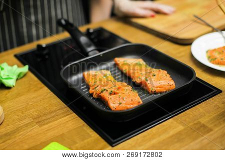 Slice Pizza In Box And Can Of Soda On Wood Background