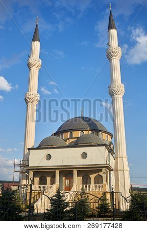 LEVADKI, CRIMEA - JUN 10, 2018: Qadir-Jami Mosque during repairing works. Mosque in Levadki is decorated with two minarets forty meters high.