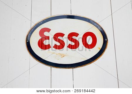 Lugner, Sweden - July 9, 2018: Old Esso Gasoline Brand Logo Sign On A Wooden Wall.