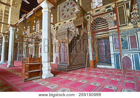Cairo, Egypt - December 21, 2017:  The Carved Wooden Minbar (pulpit) With Ivory Inlay And Honeycomb 